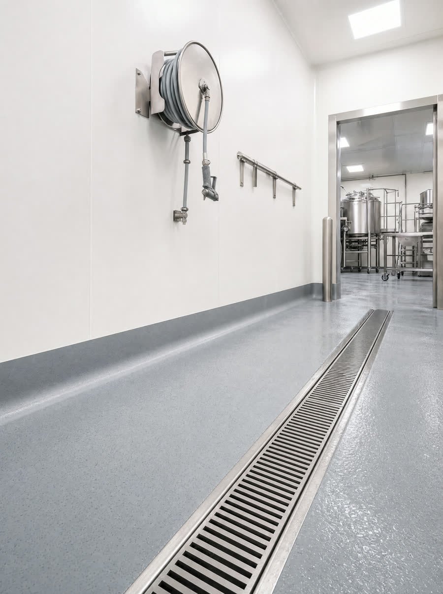Washdown areas, finished in hygienic wall cladding with a coved floor junction.